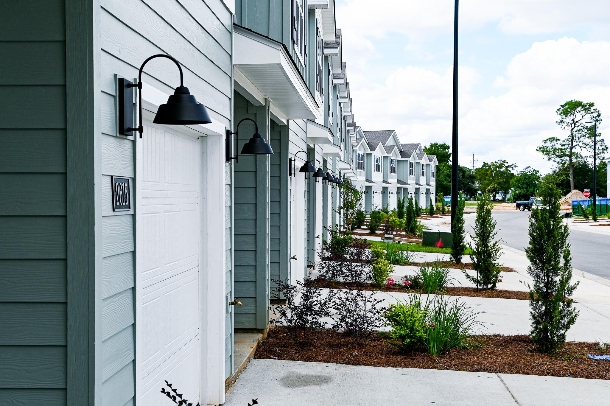 The Island Townhomes – Entrance with lighthouse tower